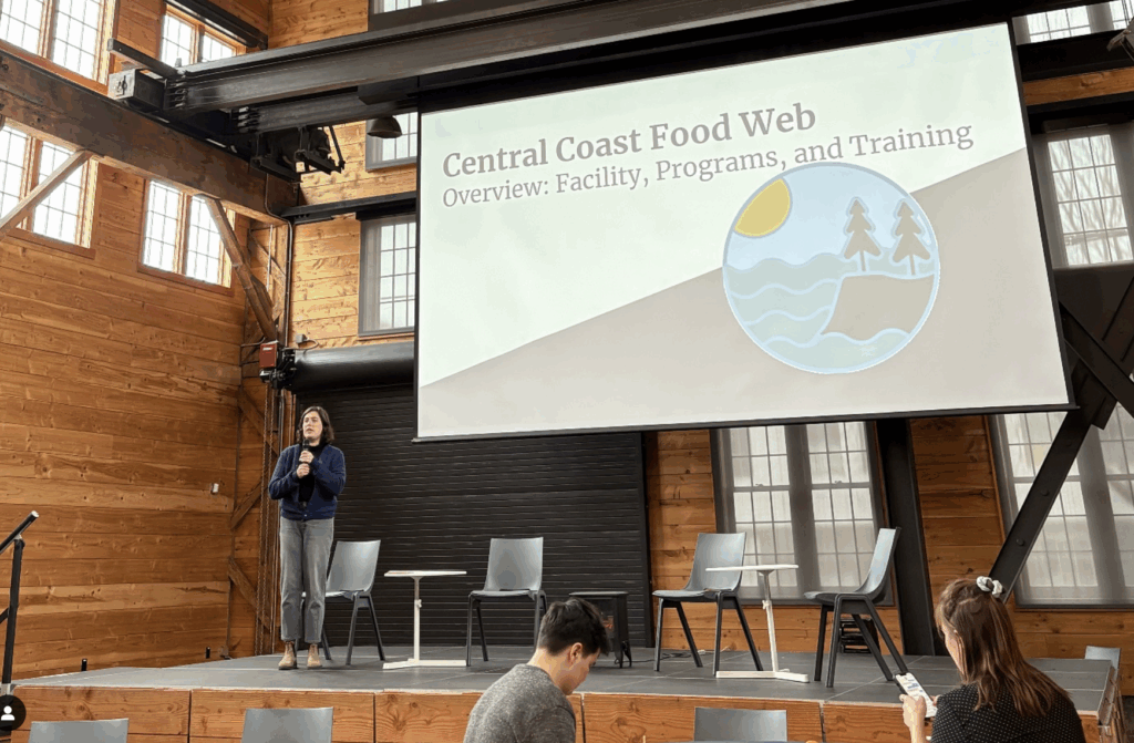CCFW employee presents in front of a large screen